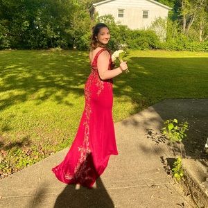 Burgundy prom dress, size large, medium sized train. Worn once.